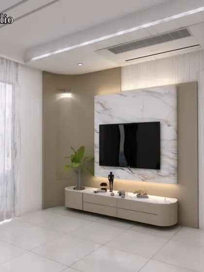 A minimalist TV wall design where the focus is on clean lines and natural light. The sheer curtains diffuse sunlight beautifully, and the simple floating console keeps the space feeling open.