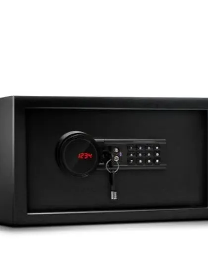 A studio shot of the Tusker-10 NXT, highlighting the red glow of its LCD display and the included emergency key.