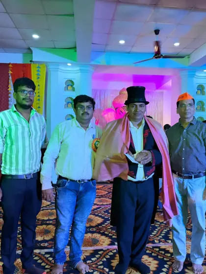 Posing with the event organizers after being honored at the Ganesh Utsav show. Their appreciation means a lot to me.