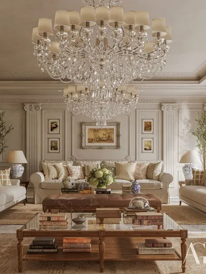 A full view of the drawing room, where two grand crystal chandeliers command the space. The symmetrical arrangement of furniture, flanked by potted trees, creates a sense of balanced and cultivated opulence.