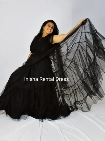 The lightweight tulle fabric of this gown moves beautifully, adding a touch of grace to every photo.