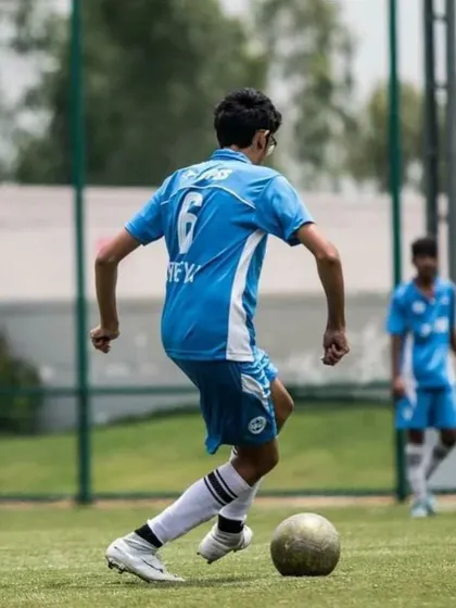 Athreya Raman in action for BPSS. His development from a quiet player to a dominant midfielder shows the transformative power of our coaching philosophy.