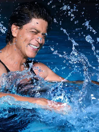 A throwback to a fun summer shoot with Shah Rukh Khan. The idea was simply to capture a moment of pure joy. The splash of water and his spontaneous smile make this an image full of life and energy.