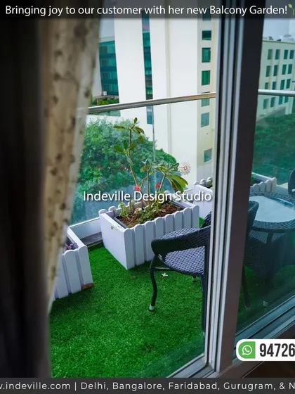 Looking through the window at the newly greened balcony. The space is now a welcoming retreat, visible and accessible right from the living area.