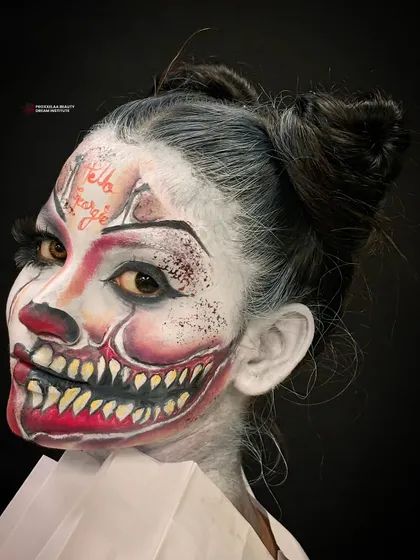 A different angle of the horror clown, showing the creepy, wide-eyed stare. This is not for the faint of heart.