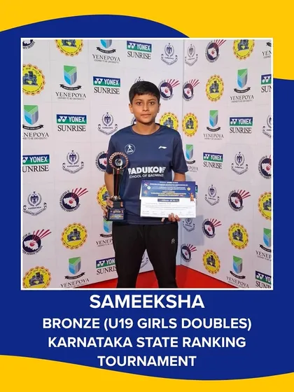 Sameeksha, a winner at the Karnataka State Ranking Tournament, proudly displays her trophy and certificate. We celebrate the achievements of every player, providing a platform for them to shine.