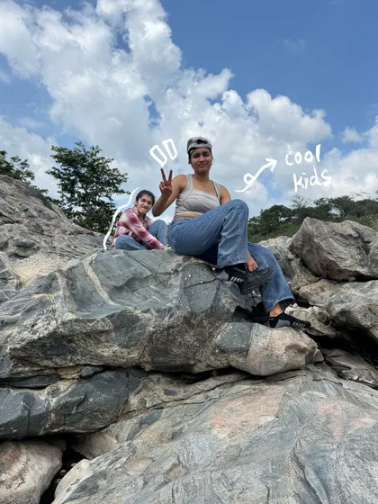Just cool kids on the rocks. A simple doodle and text add a bit of personality to this group photo.