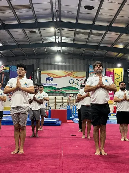 Gymnastics isn't just for kids. Our adult classes, like this special session for International Yoga Day, focus on building strength, flexibility, and finding a fun alternative to a boring gym routine.