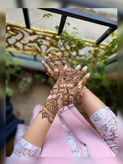 A beautiful pose showcasing an intricate party henna design.