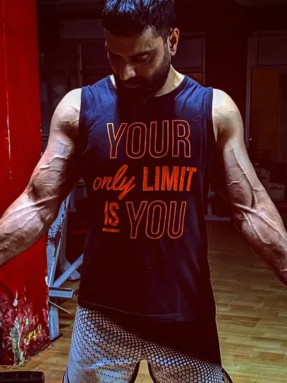 The vascularity and muscle definition shown here are byproducts of a low body fat percentage and consistent, heavy strength training.