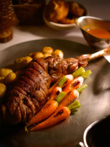A close-up of the magnificent roast leg of lamb from our Christmas menu. This dish was available by pre-order and became a centerpiece for many holiday celebrations.