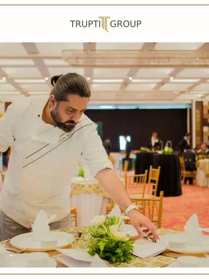 From founders to servers, our team puts heart into every detail. Here I am personally overseeing the table setup to ensure everything is perfect for the event.