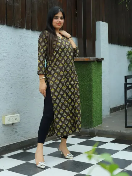 A simple and elegant portrait showcasing a printed kurta. This type of clean, well-lit shot is perfect for a brand's online catalogue or a fashion blogger's lookbook.
