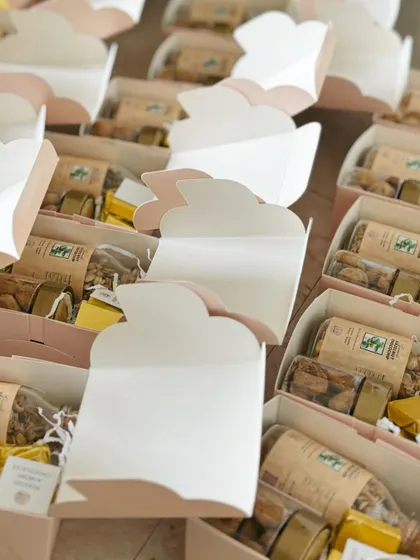 Preparing return favours for a Ganesh Chaturthi celebration. These custom boxes are filled with our healthy, eggless treats for guests to take home.