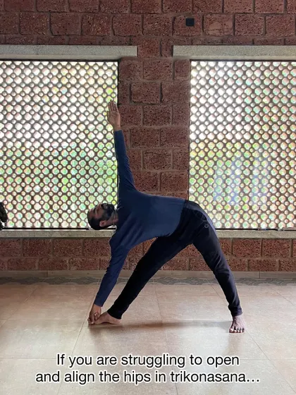 If you are struggling to open the hips in Trikonasana, don't force it. Accept where your body is and work from there. The rest will come with consistent, mindful practice.