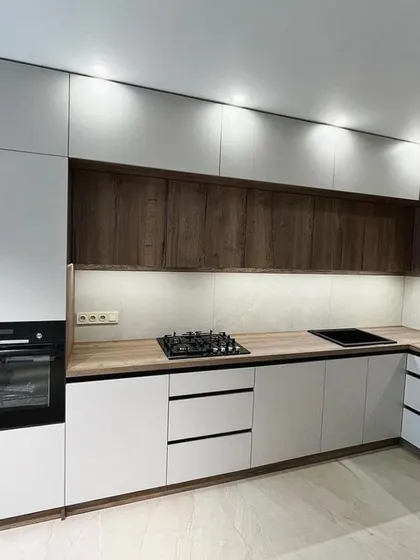 A final look at the Vasant Kunj project, showcasing the balanced composition of colors and textures. The design proves that a modern kitchen can also feel warm and inviting.
