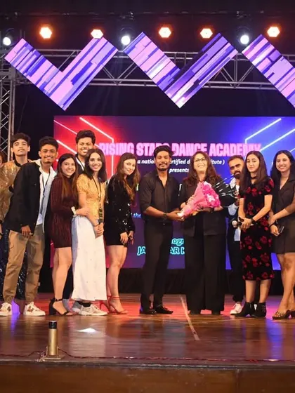 Another shot with the talented team and Geeta Maa. It's an honor to be part of events that celebrate art and talent, and to host the masters of the craft.
