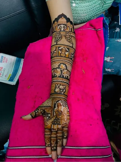 A single-arm view of the design in image 91, showing how the story unfolds from the palm to the elbow.