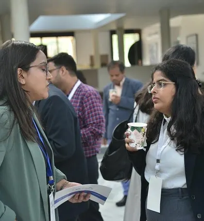 Discussing ideas at the IFCCI CSR Connect Seminar at the French Embassy. It's important to stay informed about Corporate Social Responsibility and ESG standards.
