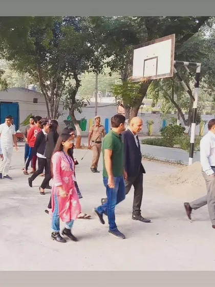A candid moment during a tour of the Tihar Jail premises with fellow volunteers and officials. Understanding the environment is crucial for effective legal aid work.