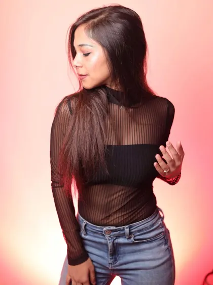 A studio portrait with a modern, edgy vibe. This shows a different side of my personality, confident and contemporary.