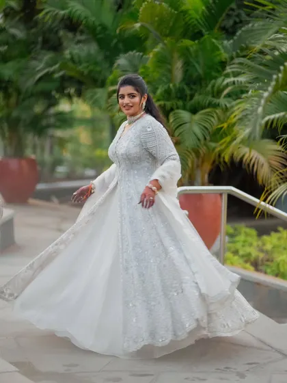 Another dynamic shot of the bride twirling in her Sangeet lehenga. The movement shows just how light and comfortable the outfit is, proving you don't have to sacrifice style for comfort.