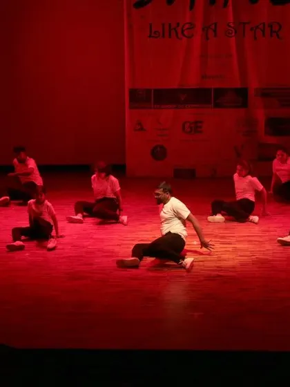 A floor-work section of a contemporary group dance.
