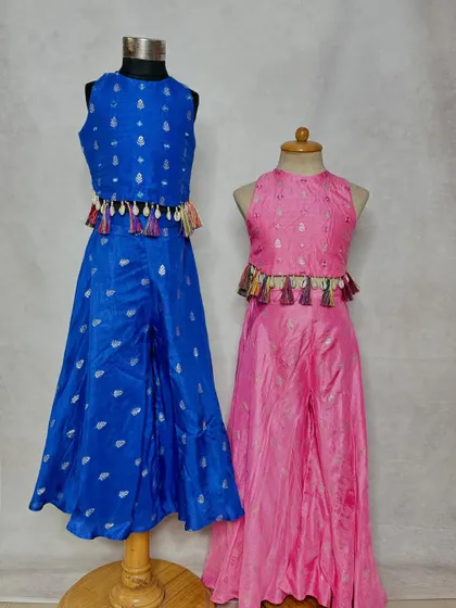 Another view of our popular sharara sets, highlighting the tassel details on the crop top and the comfortable, wide-legged pants perfect for twirling.