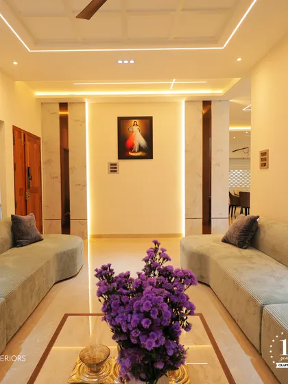 Another view of the formal living room, highlighting the clean lines and serene ambiance. The subtle wall paneling and soft lighting create a perfect backdrop for relaxation and conversation.