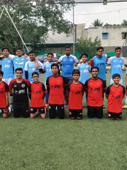 Two teams from our youth program come together for a group photo, showcasing the depth of our academy.