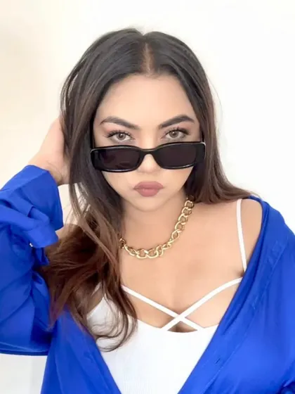 Another take on the cool, confident look with sunglasses.