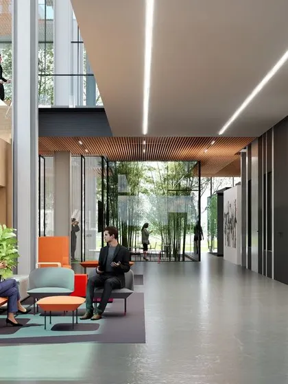 The main hall of the 'ePositive' campus, where the large wooden staircase provides seating for informal gatherings and presentations. The design uses natural light from expansive windows and a large LED screen to create a dynamic and inspiring environment for innovation.