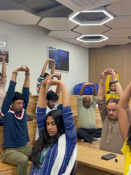 You don't need a yoga studio to find relief. Here, I am guiding the team at Ninjacart through simple desk stretches. These movements are designed to release tension in the neck, shoulders, and back, which is common from long hours of sitting.