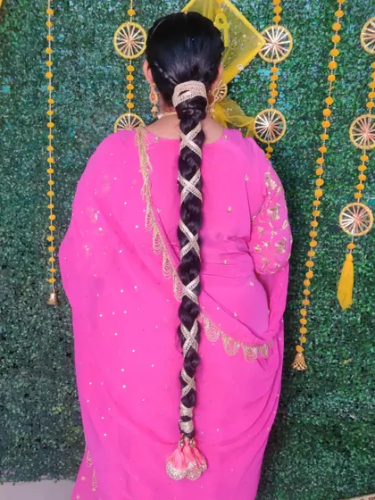 Another angle of the Lohri hairstyle, perfect for festive pre-wedding events.