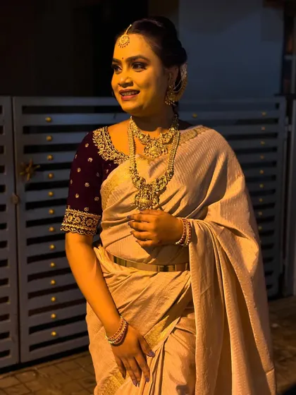 Another angle from the same photoshoot, showing the complete look with the simple, elegant hairstyle.