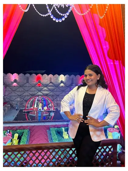As a Marathi mulgi in business, I put my passion and reputation into every event. Here I am, ensuring every detail is perfect for a grand wedding celebration. Your happiness is my success.