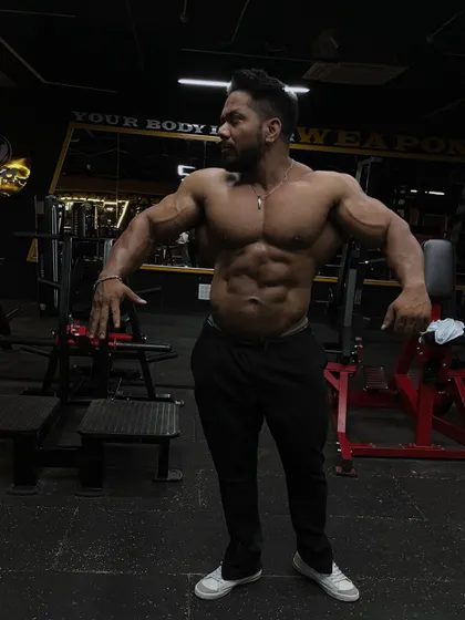 A classic physique pose.