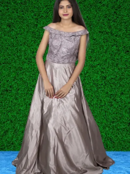 A sophisticated grey gown with a textured, off-shoulder bodice and a smooth satin skirt. This is a great choice for a formal event or an elegant photoshoot.