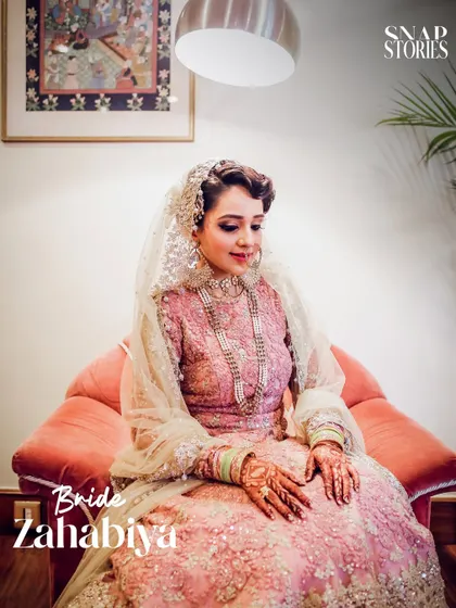 An elegant, vintage-style portrait of a bride in her beautiful pink gown. We can adapt our style to match the theme of your wedding, from modern to classic.