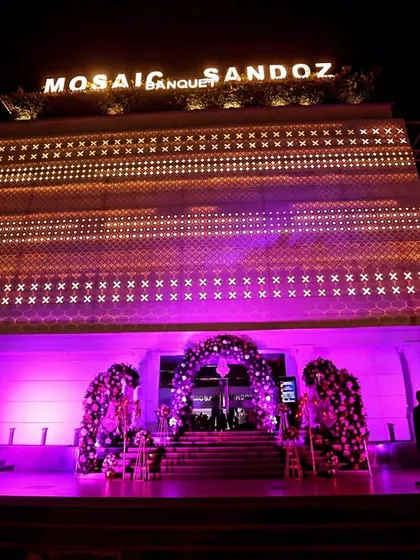 The stunning exterior of the Mosaic Banquet hall, lit up for a grand Diwali party. Capturing the venue sets the stage for the incredible celebration inside.