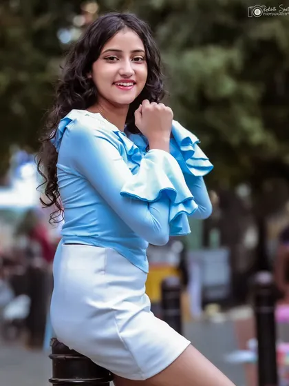 Another joyful shot, showing the model's bright personality.