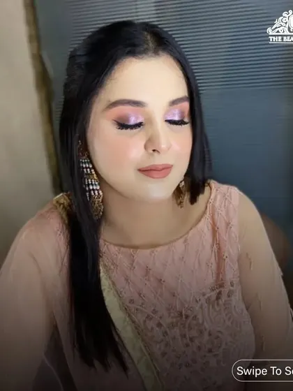 A close-up of the final look from the video, showing the beautiful pink eyeshadow and glowing skin.