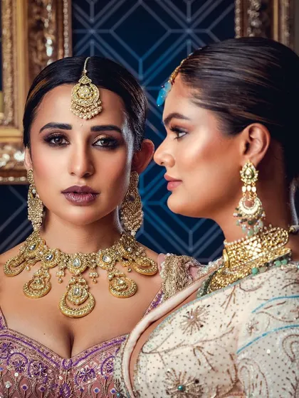 A dual-model bridal shoot showcasing two complementary looks. This type of shot is effective for lookbooks, as it displays variety and coordination within a designer's collection.