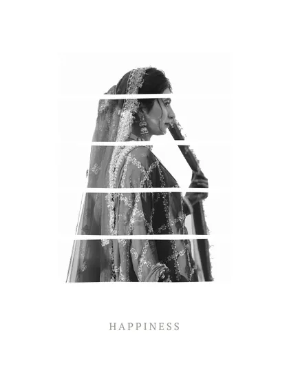 A minimalist and artistic black and white portrait of the bride, focusing on her silhouette and the feeling of happiness.