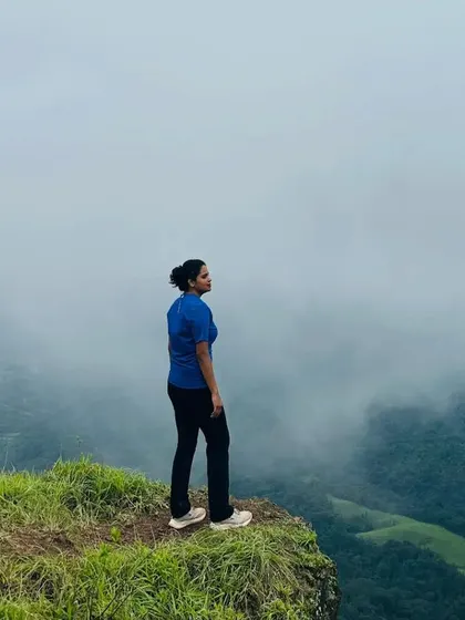 A solitary moment on the Gangadikal trek, overlooking the vast expanse of the Kudremukh range.