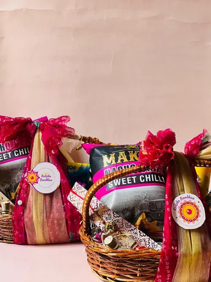 A pair of matching wicker basket hampers for Rakhi, showcasing a consistent and beautiful gifting option for multiple siblings.