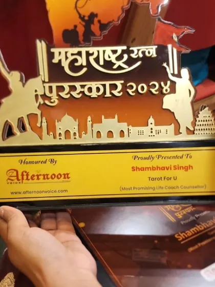 A close-up of the beautiful Maharashtra Ratan Puraskar 2024 trophy, honoring me as a "Most Promising Life Coach Counsellor".