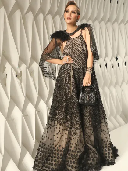 The full shot, where the makeup enhances her features and completes the high-fashion aesthetic of the entire look.