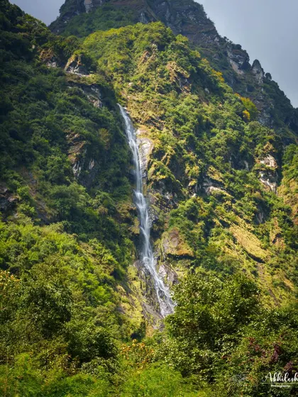 The raw beauty of the Himalayas is unmatched. This powerful waterfall was just one of the many incredible sights on our journey to Annapurna Base Camp, a trek filled with natural wonders.