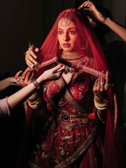 The final touches before the ceremony, a behind-the-scenes look at the bride getting ready.